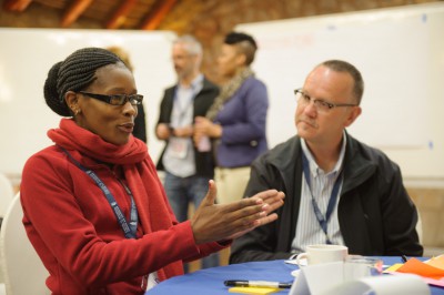 Inaugural participants discussing. Photo by Eyescape Corporate Photography