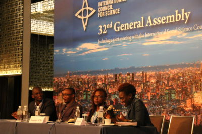 Tolu Oni moderates panel at ICSU assembly. Photo by Pichi Chuang