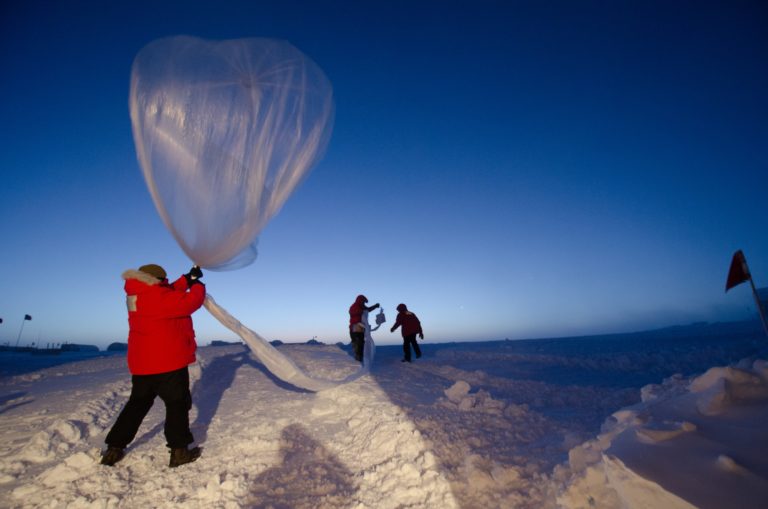Launching an ozonesonde balloon. Photo by U.S. National Oceanic and Atmospheric Administration on Unsplash